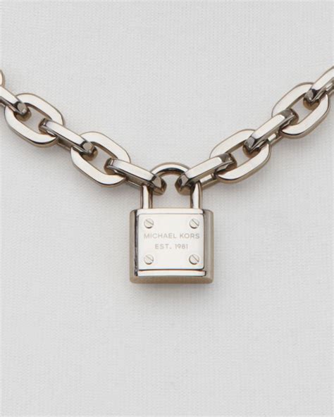 michael kors lock necklace|Michael Kors silver necklace.